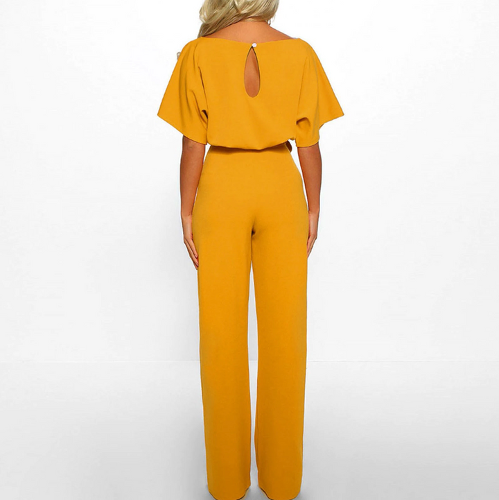 Easy-to-wear elegant wide-leg jumpsuit for women. Comfortable, chic, & stylish. Perfect versatile summer outfit.