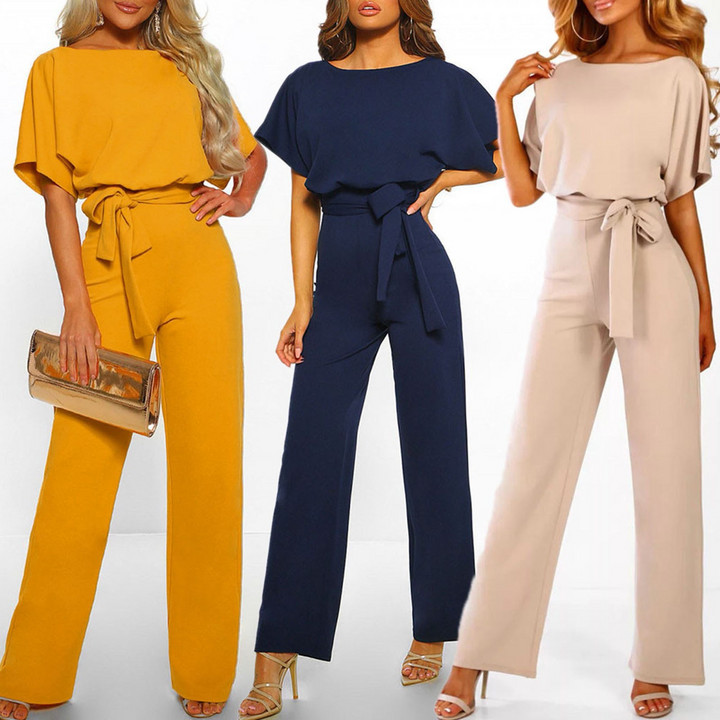 Elegant women's wide-leg jumpsuit, perfect for chic comfort. Versatile day to night style & flattering fit.