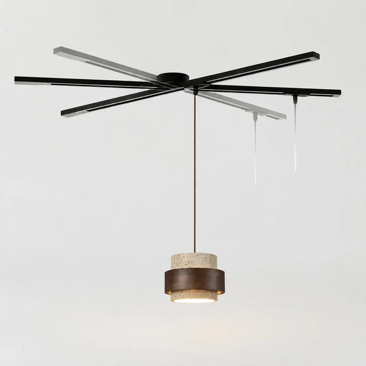 Modern adjustable black pendant light rail for dynamic home interior lighting.