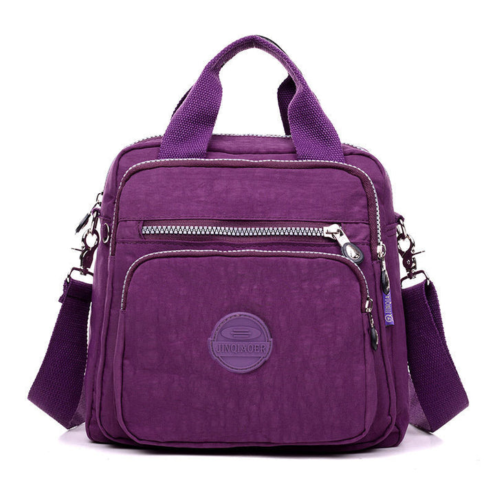 Secure new water-resistant women's crossbody bag, ideal for daily commutes and keeping items dry.