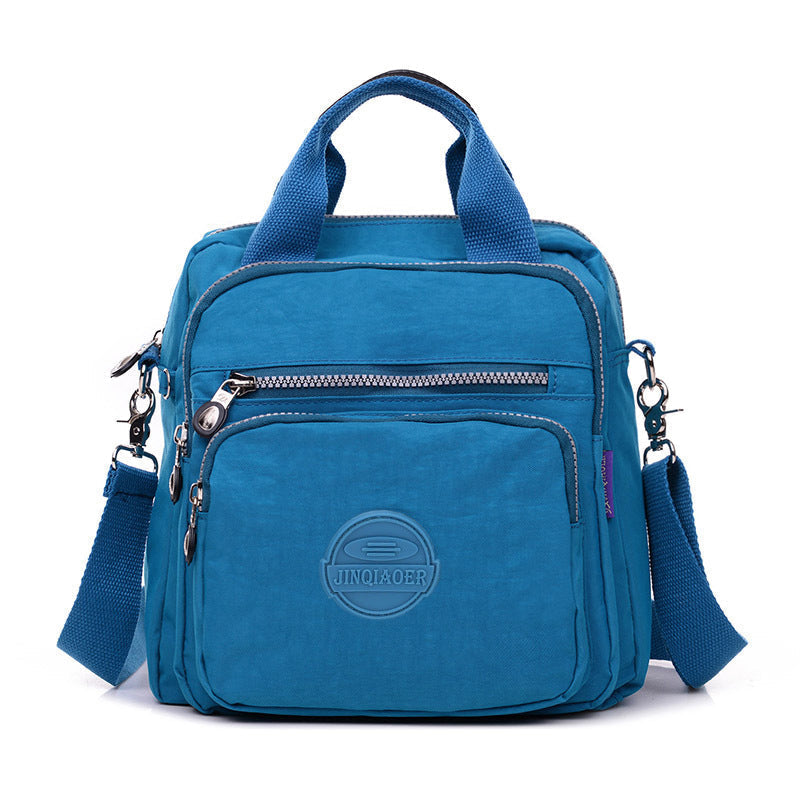 Practical new multi-compartment water-resistant bag for women, keeping essentials safe and dry.