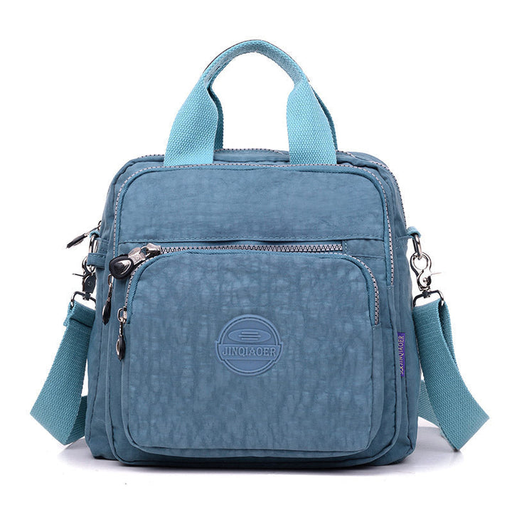 Rugged new water-resistant women's crossbody bag, built for everyday adventures and reliable protection.