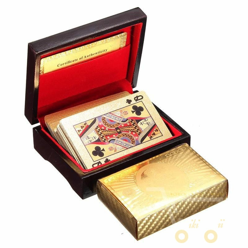 Exquisite wooden box displaying a luxury 24K gold-plated playing cards deck, perfect for game night.