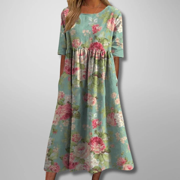 Mint green relaxed fit floral midi dress for women. Elegant & versatile for spring, summer, and everyday wear.