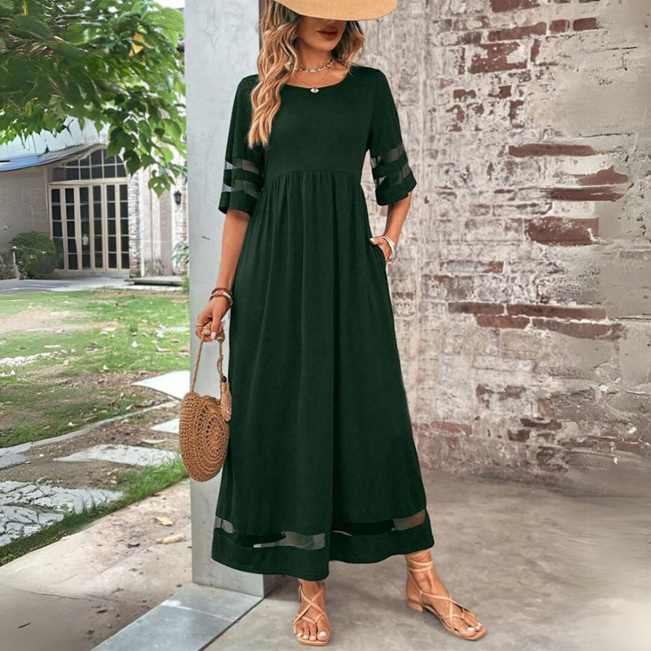 Chic women's long sleeve midi dress; elegant, flattering, and versatile for day-to-night wear, featuring an empire waist.