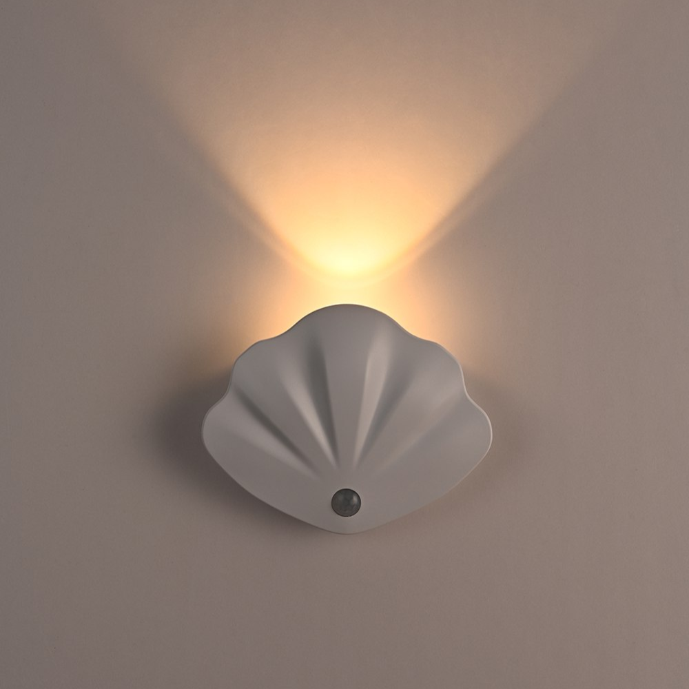 Automatic motion sensor night light for home safety, rechargeable & wireless LED lighting.