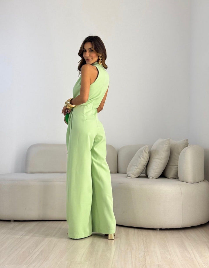 Chic women's halterneck jumpsuit with wide-leg design, ideal for summer occasions.