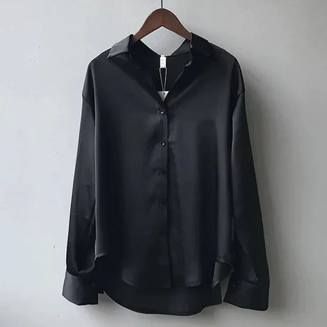 Chic women's all-season blouse, loose fit, long sleeve, collared. A versatile and elegant top for women.