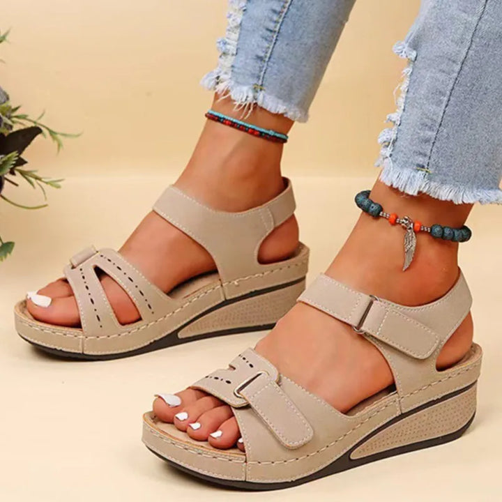 Cushioned women's orthopedic sandals with arch support for ultimate comfort. Perfect open toe summer footwear.
