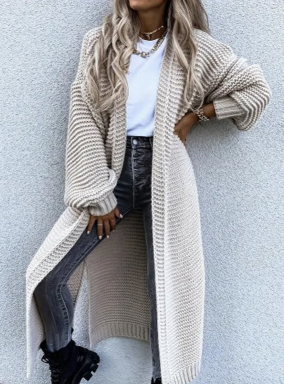 Women's versatile long sleeve knit cardigan, perfect for layering over office or casual wear in fall/winter.