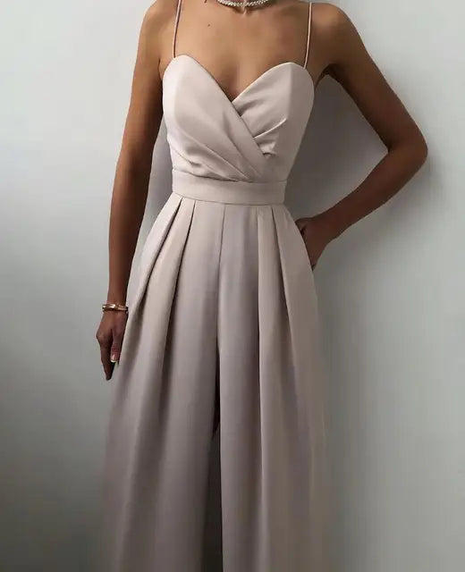 Elegant wide-leg women's jumpsuit with spaghetti straps. Versatile & comfortable one-piece for any season.
