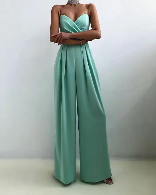 Stylish women's wide-leg jumpsuit, featuring spaghetti straps. An elegant one-piece for a sophisticated summer look.