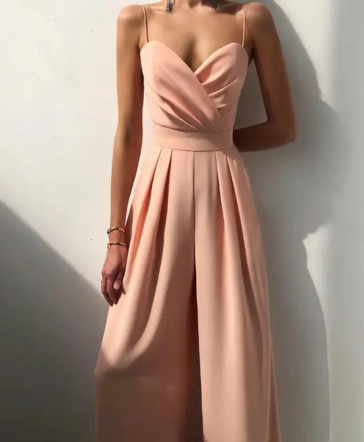 Dressy wide-leg women's jumpsuit, spaghetti strap design. Ideal elegant evening wear or special occasion outfit.