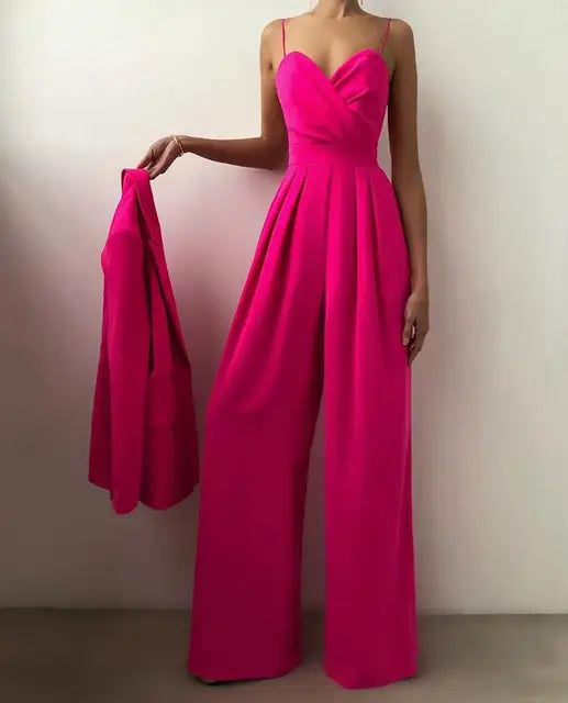 Flowy wide-leg women's jumpsuit with spaghetti straps. Experience elegant comfort, perfect for summer and evening wear.