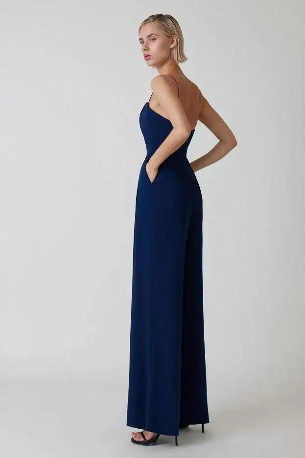 Flattering wide-leg women's jumpsuit with thin spaghetti straps. Creates an elegant silhouette for summer or evening.