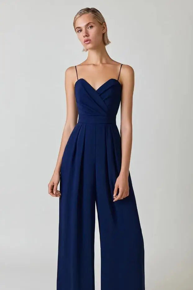 Elegant wide-leg women's jumpsuit with thin spaghetti straps. Perfect for versatile summer fashion & evening wear.