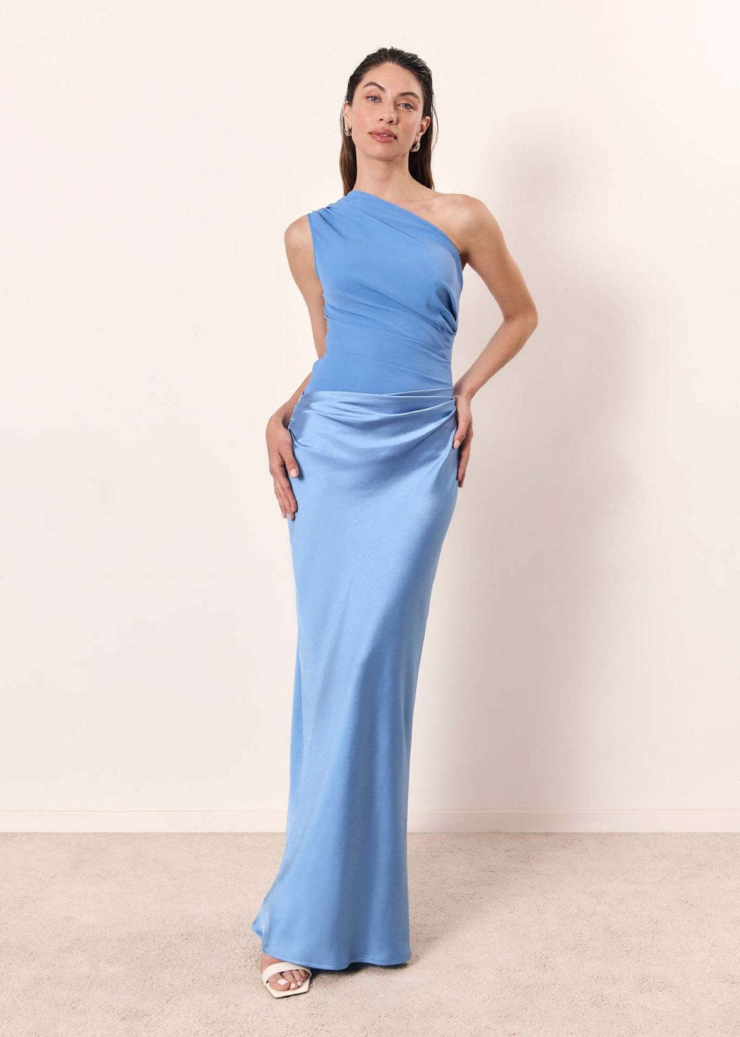 Sophisticated dark brown one-shoulder maxi dress. Women's elegant formal wear, perfect for an evening out or wedding.