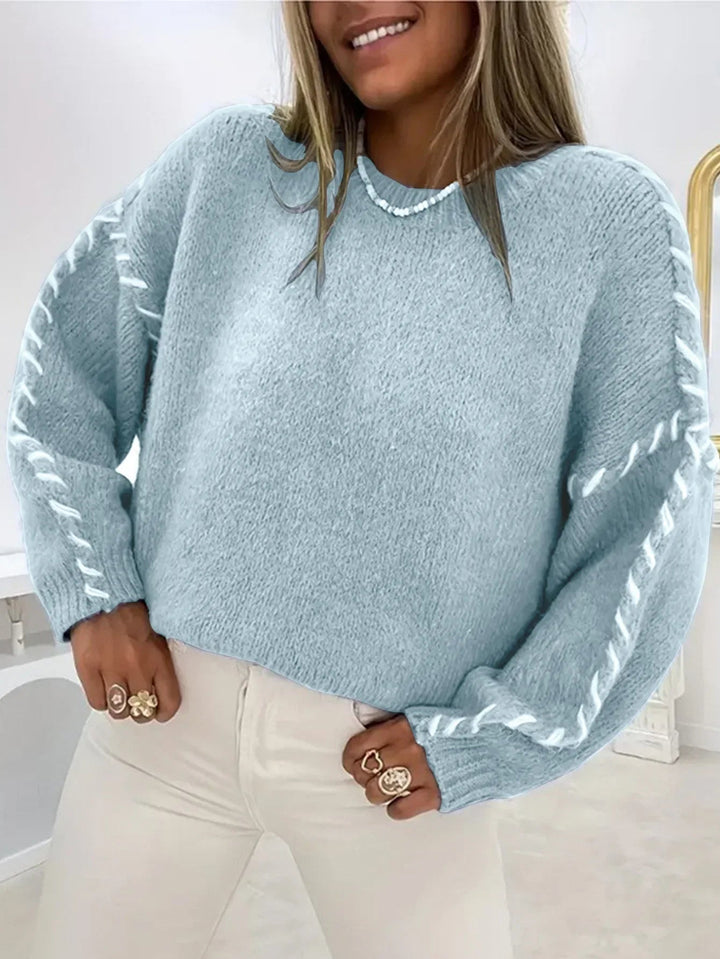Versatile women's chic pullover sweater, a cozy everyday essential for casual, warm winter fashion.
