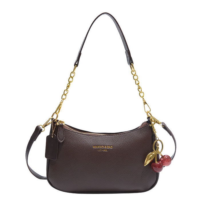 Versatile white structured women's shoulder bag, made from elegant faux leather.