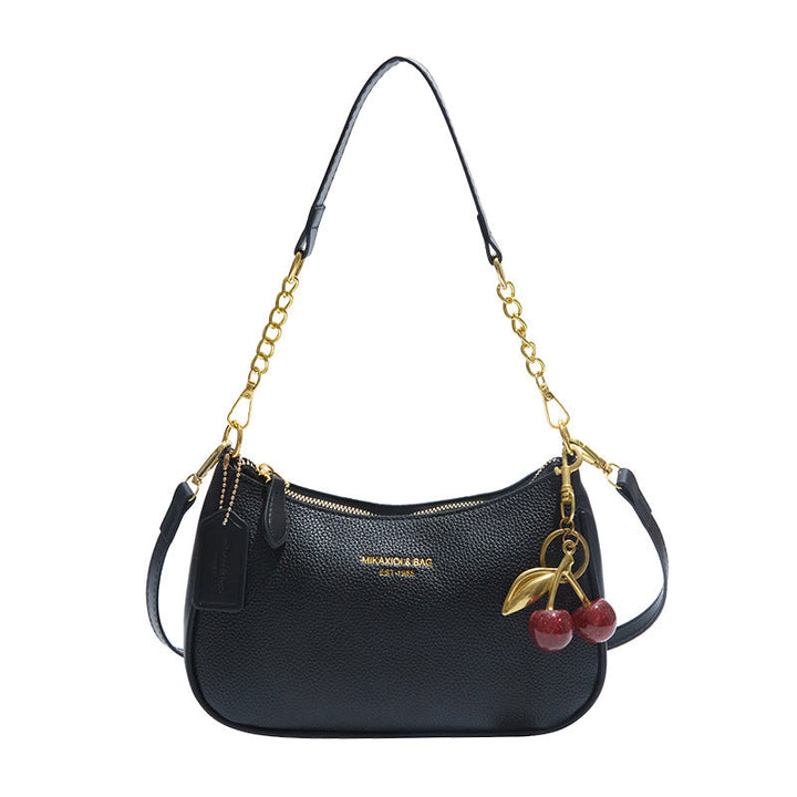 Elegant structured faux leather shoulder bag, women's chic crossbody handbag.