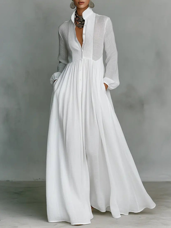 Women's collared relaxed fit maxi dress with button-down front. Effortless style for everyday wear.