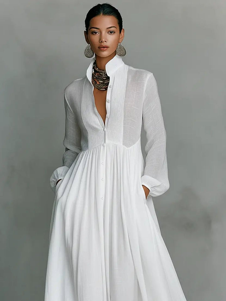 Stylish women's maxi dress featuring a classic collar and full button-down front for a relaxed, elegant look.