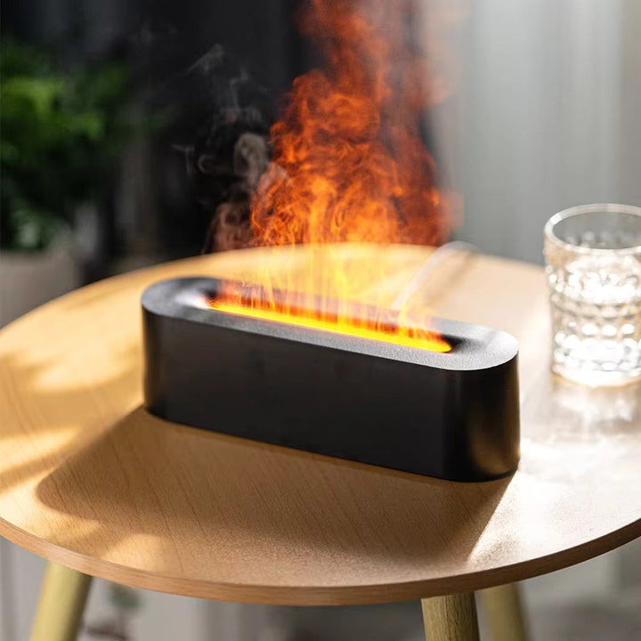 Portable aromatherapy diffuser & humidifier with realistic flame effect. USB powered LED mist.