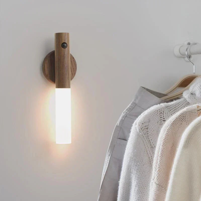 Sleek magnetic LED night light with motion sensor, perfect for modern indoor lighting.