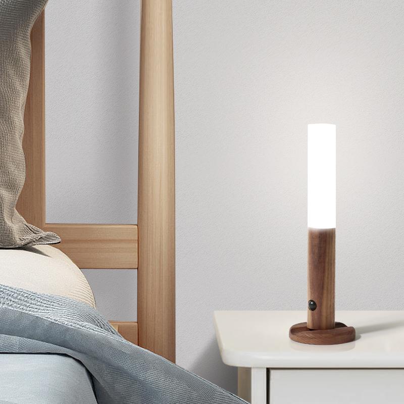 White modern LED wall light with motion sensor, magnetic base, and USB rechargeable function.