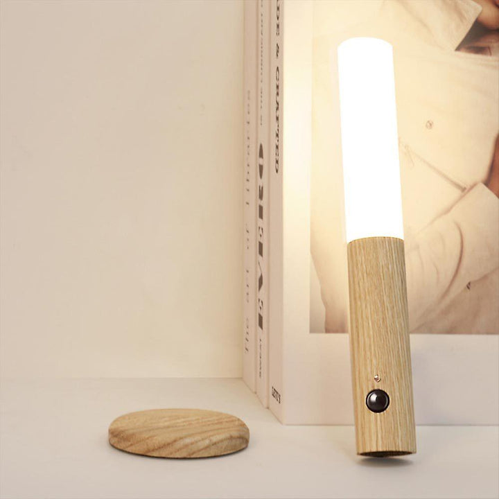 Magnetic mount modern LED light, rechargeable and motion sensing for smart home decor.