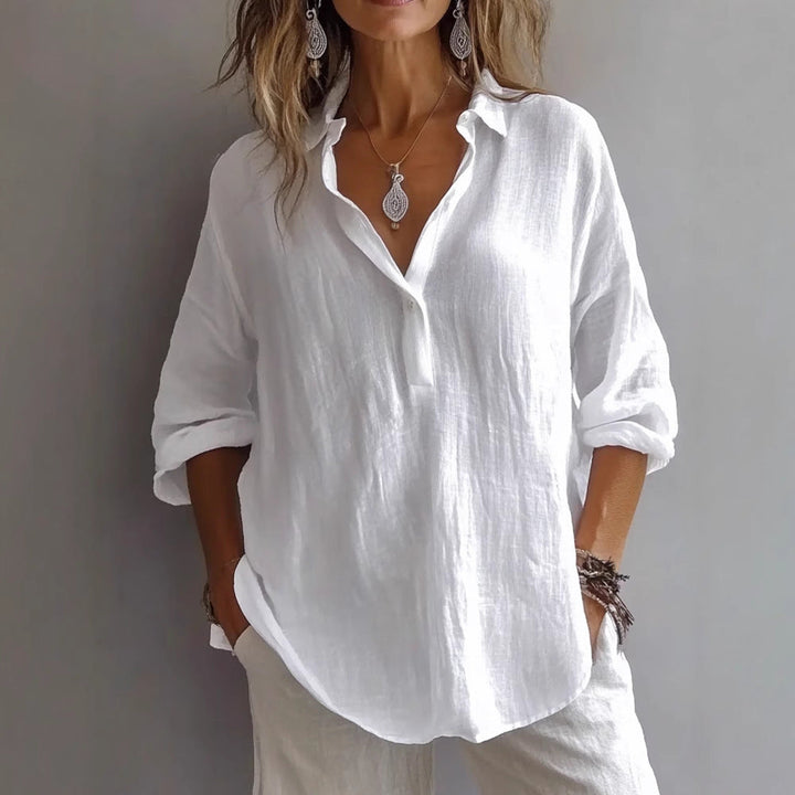 Versatile women's button-up blouse, wide sleeves, chic and comfortable for any occasion.