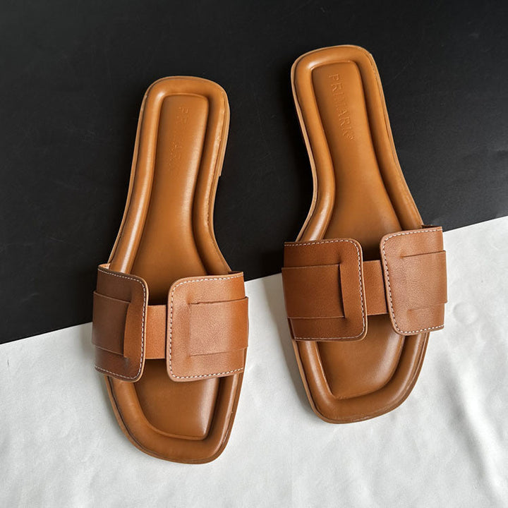 Versatile fashion slides for women, chic and comfortable slip-on sandals for summer footwear.