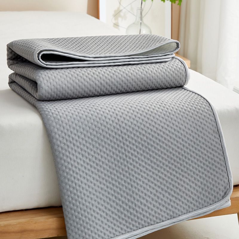 Washable cooling mattress topper for hygienic sleep, featuring breathable material and plush comfort.