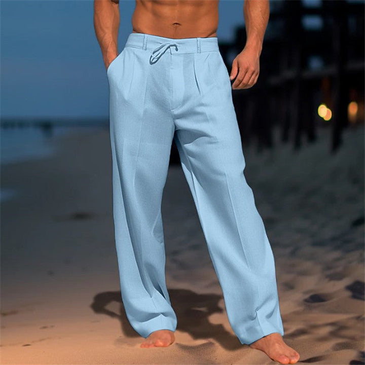 Versatile white men's drawstring pants with a loose fit, perfect for comfortable casual & travel wear.
