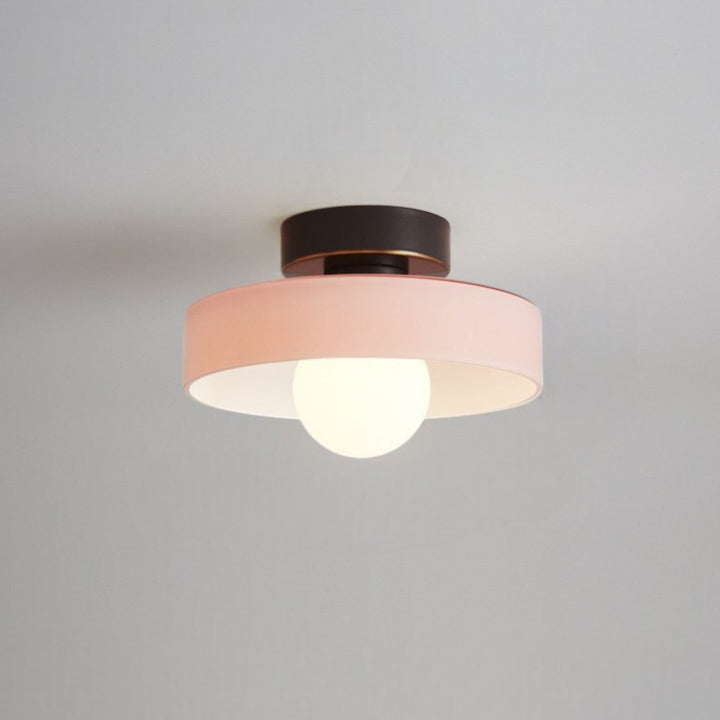Geometric Bauhaus chandelier, brass & glass, striking modern ceiling light.