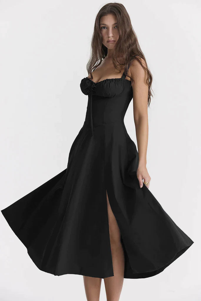 Women's summer floral party dress, elegant bustier midi length with a striking blossom print.