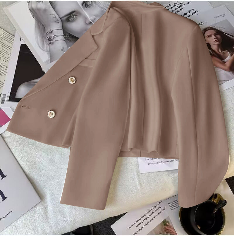 Women's cropped double-breasted lapel blazer, a tailored jacket for chic, versatile layering.