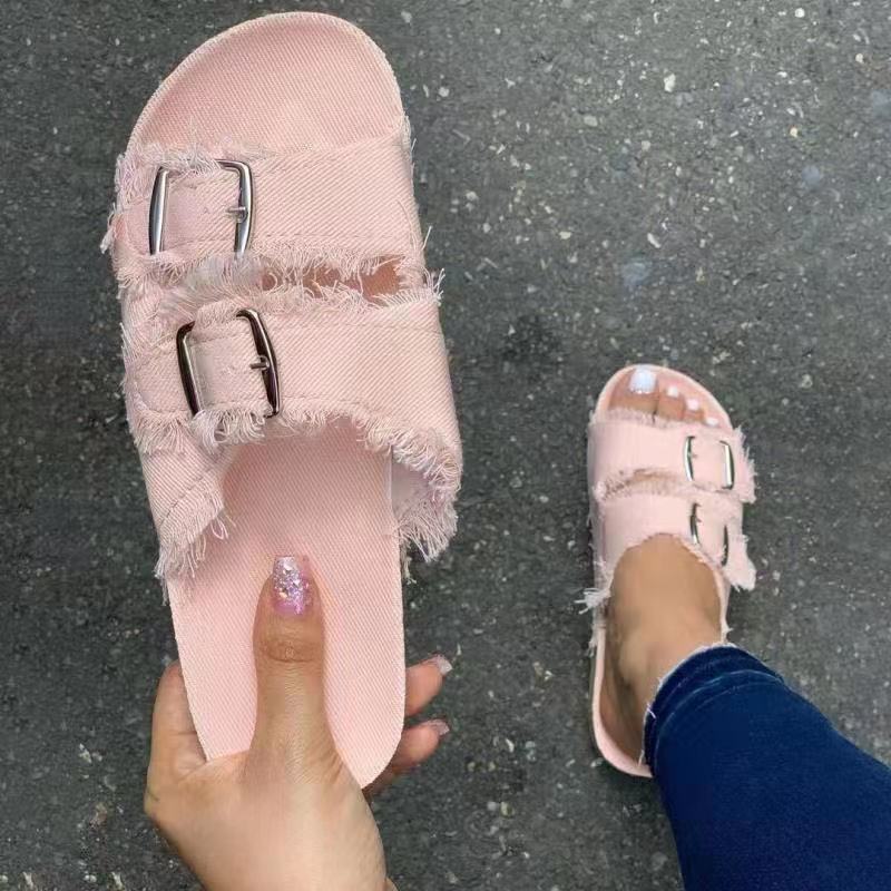 Women's distressed flat sandals with open toe for comfortable everyday casual summer wear.