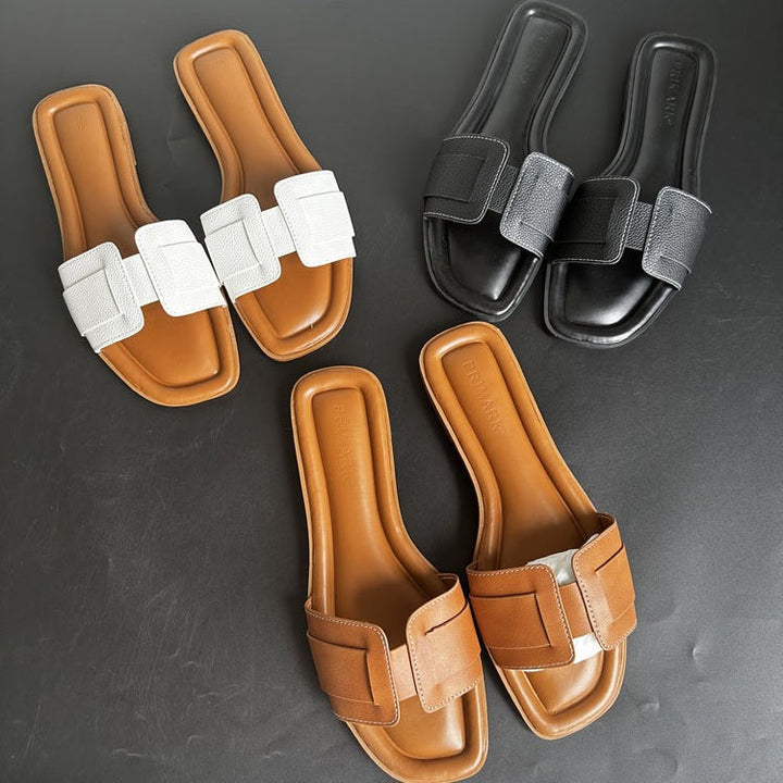 Easy slip-on women's comfort sandals, ideal summer footwear with a modern minimalist style.