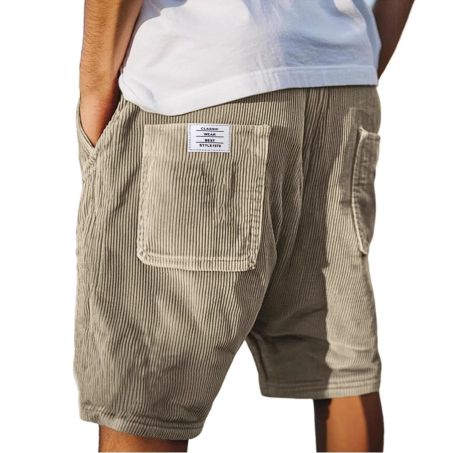 Stylish men's textured tailored shorts, offering a comfortable fit for smart casual wear or modern summer fashion.