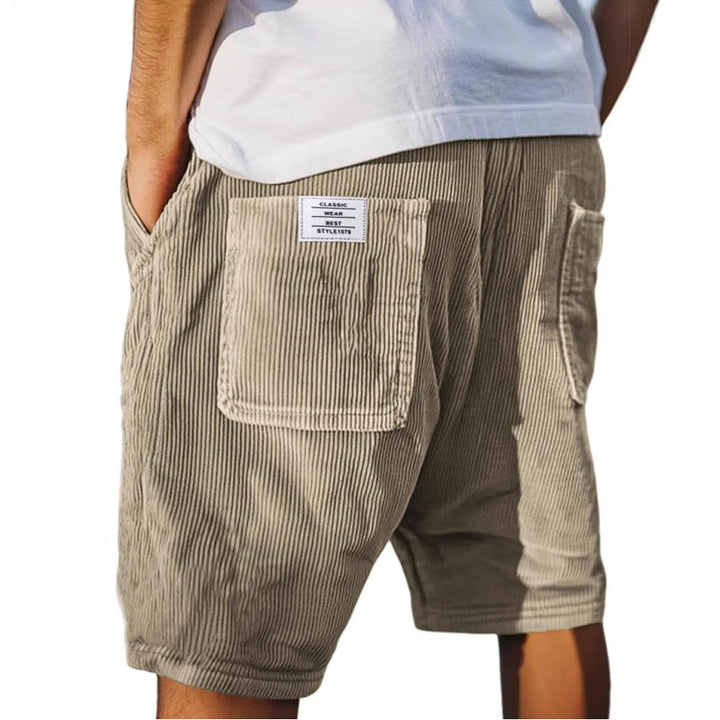 Stylish men's textured tailored shorts, offering a comfortable fit for smart casual wear or modern summer fashion.