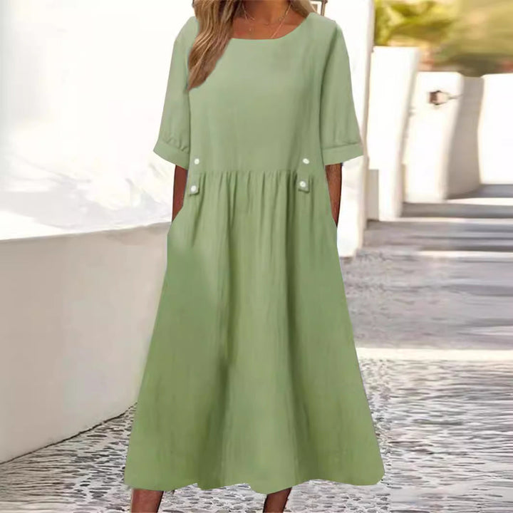 Loose fit women's summer midi dress, short sleeve & round neck, comfortable & elegant for daily style.