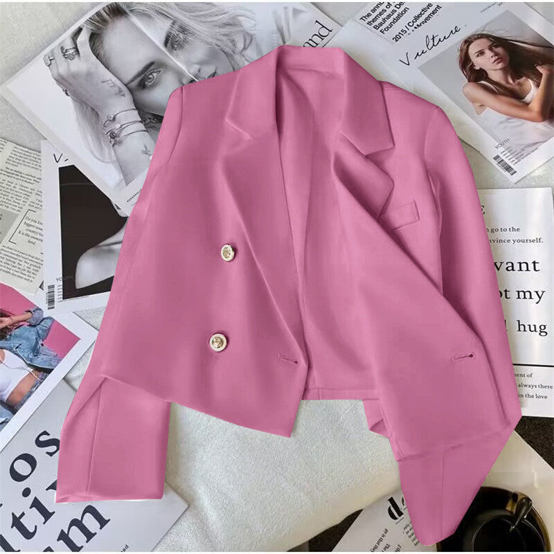 Women's tailored cropped blazer. Double-breasted lapel jacket for office chic and versatile layering.