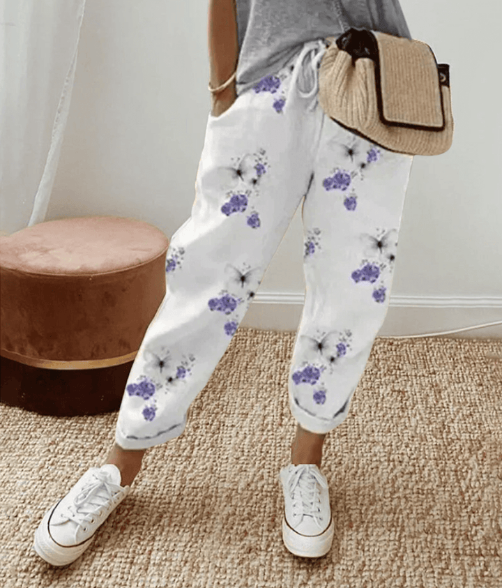 Lightweight women's flowy wide-leg pants, perfect for comfortable summer wear & stylish spring fashion.
