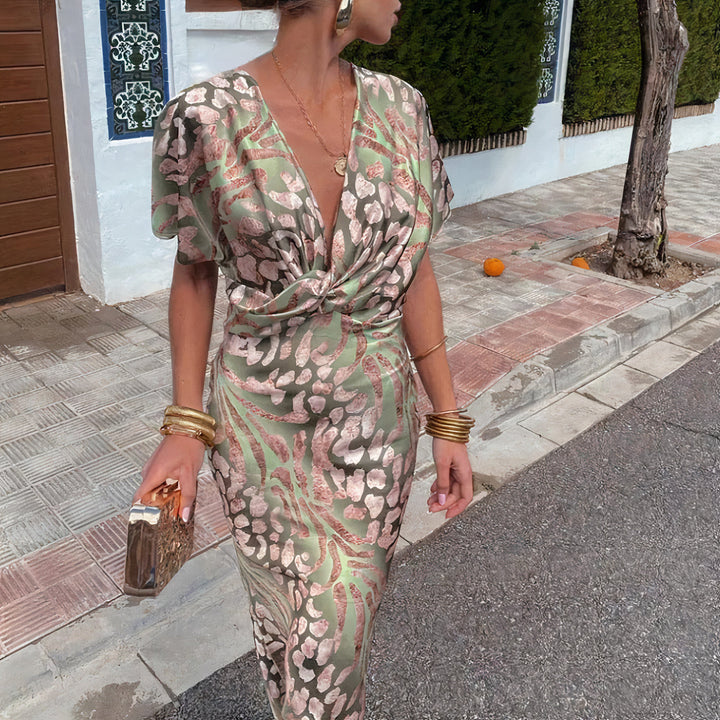Elegant women's olive dress, perfect for special occasions, parties, and evening wear. Sophisticated style with a flattering fit.