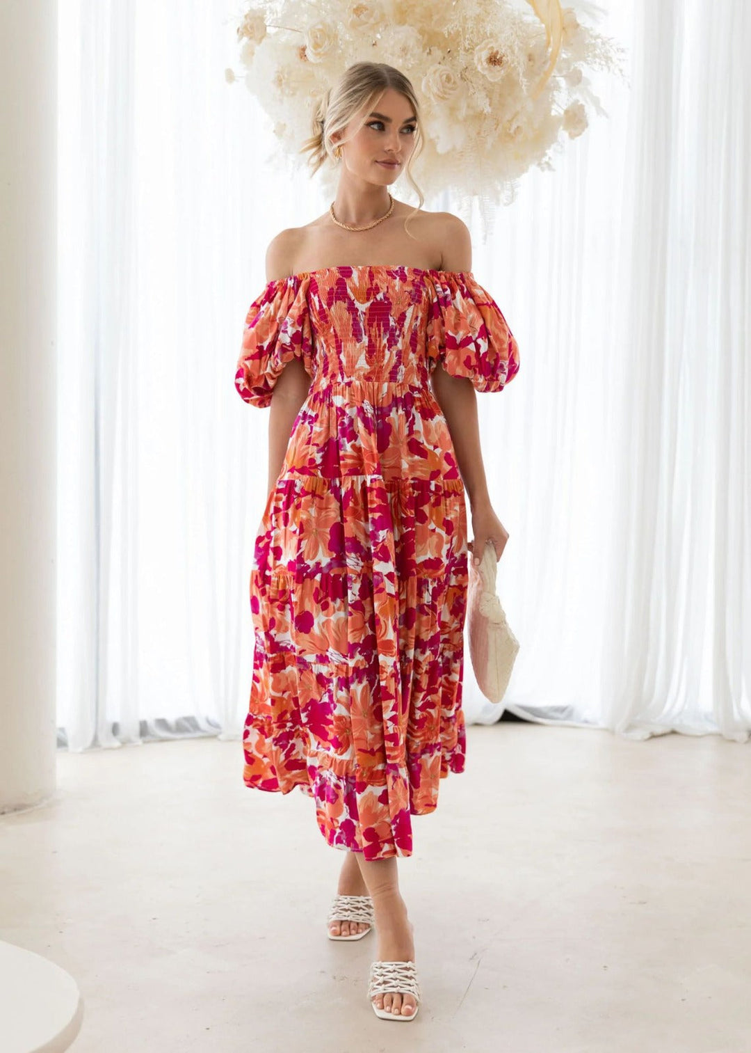 Comfortable women's short dress with vibrant floral pattern. Perfect casual summer outfit for any occasion.
