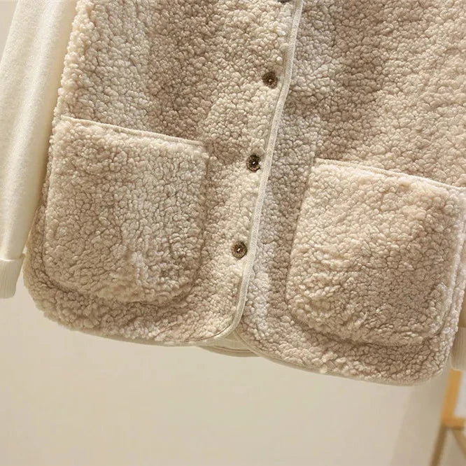 Fashionable women's knit cardigan. A lightweight, classic outerwear piece ideal for versatile styling.