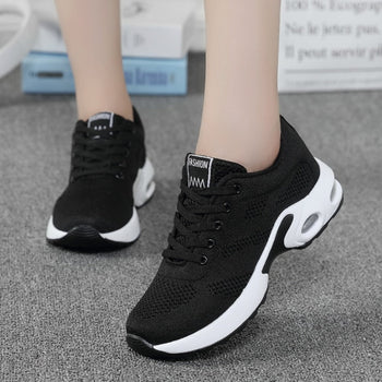 Back view: Women's comfortable walking shoes, emphasizing stable heel & cushioned design for support.