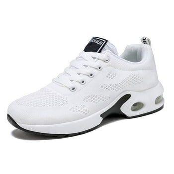 Side view: Women's comfort walking shoes, showcasing sleek design, cushioned sole, & arch support.