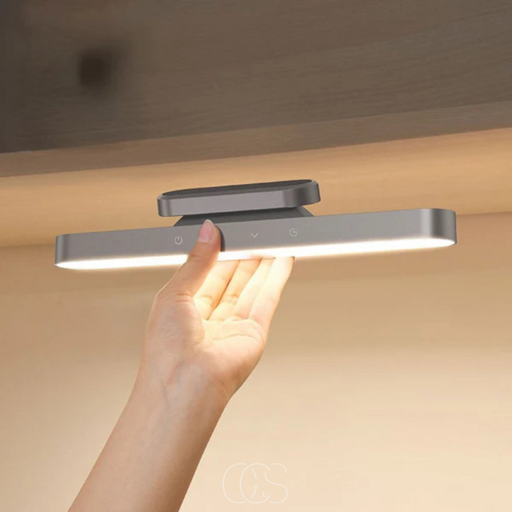 Wireless magnetic LED lamp, rechargeable, portable for home & office lighting. Easy install, adjustable light.
